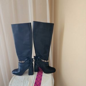 Tory Burch leather boots black.